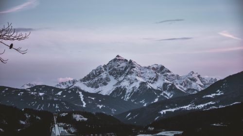 Arial view of snowy mountain peak HD Wallpaper
