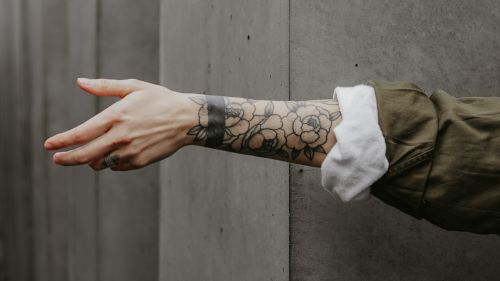 Arm covered in tattoo HD Wallpaper