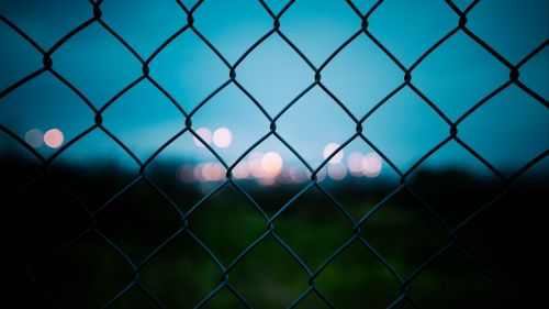 Blurry backround over the fence HD Wallpaper
