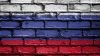 Brickwall painted under the colors of a flag HD Wallpaper