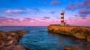 Lighthouse at a Spanih bay HD Wallpaper