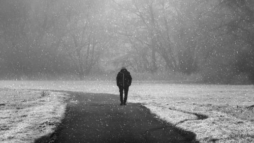 Lonely man walking on the road HD Wallpaper