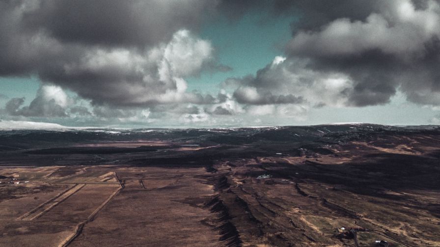 Aerial view of a cloudy landscape HD Wallpaper