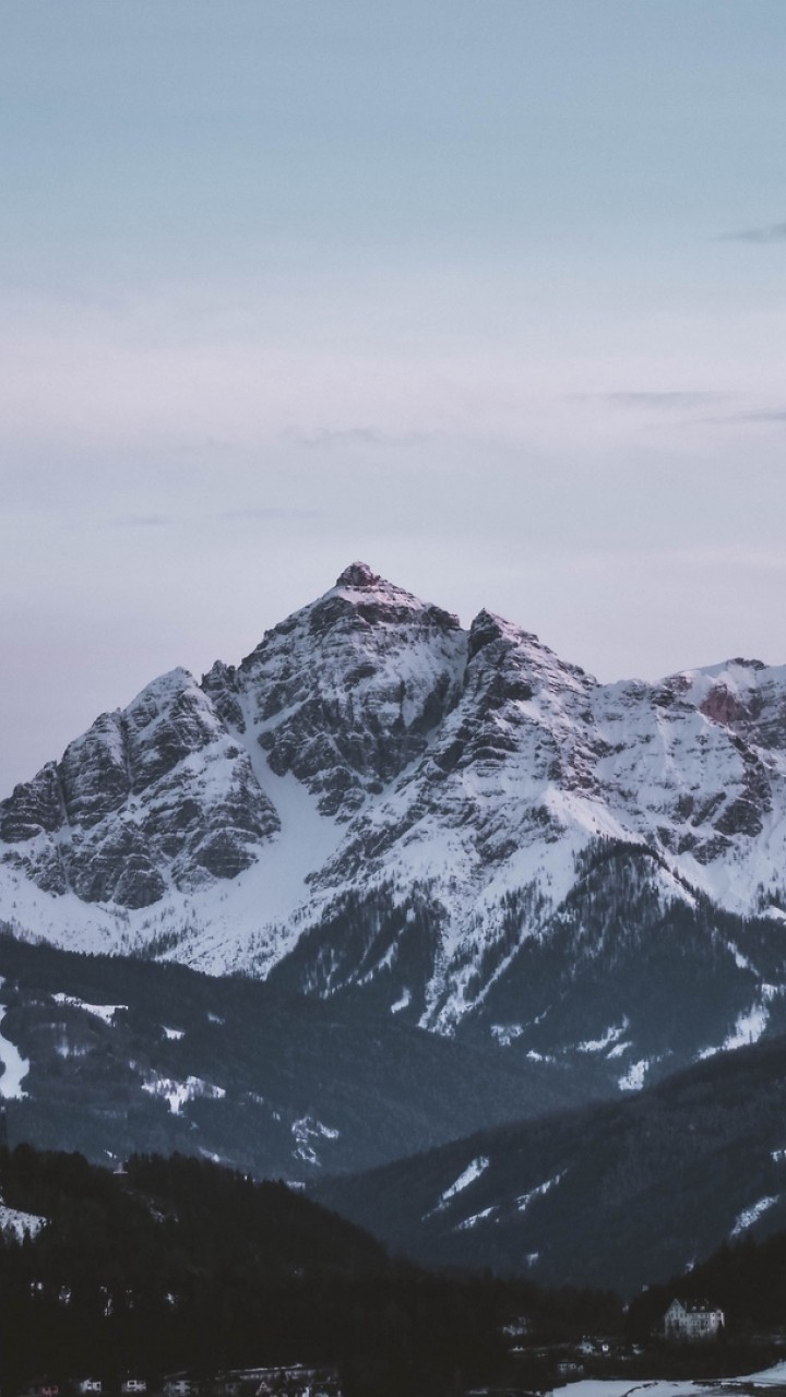 Arial view of snowy mountain peak HD Wallpaper