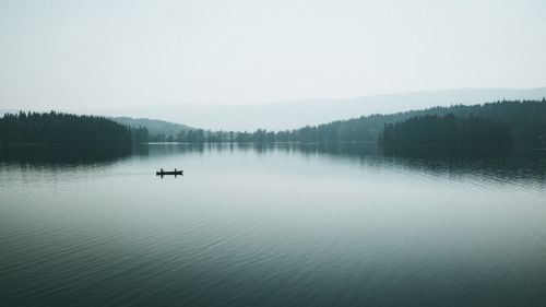 Boat at afoggy lake HD Wallpaper