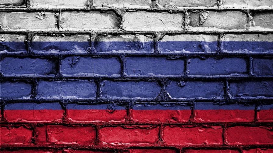 Brickwall painted under the colors of a flag HD Wallpaper