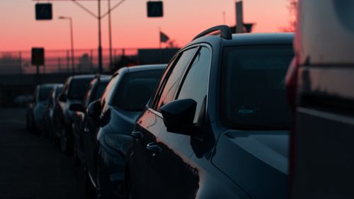 Car traffic during the sunset HD Wallpaper