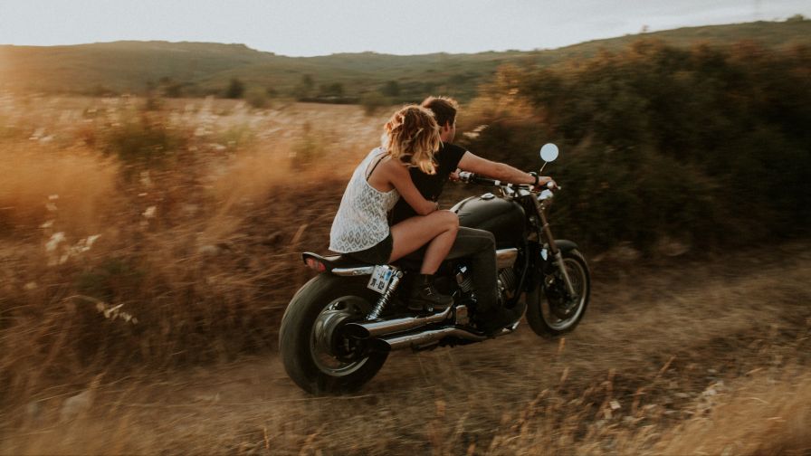 Couple on a motorcycle HD Wallpaper