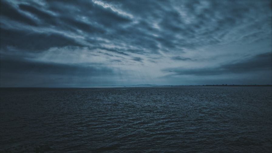 Dark clouds over the sea HD Wallpaper