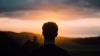 Dark silhouette of man looking at morning sky HD Wallpaper