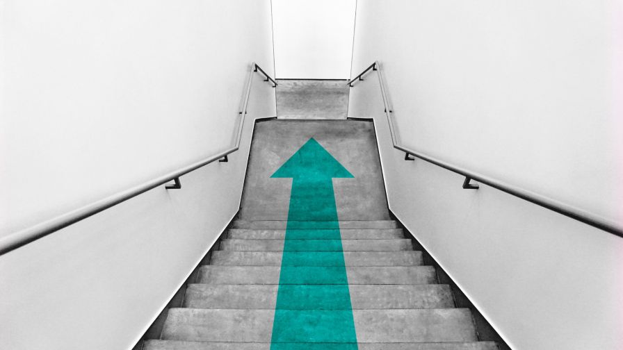 Green arrow at staircase HD Wallpaper