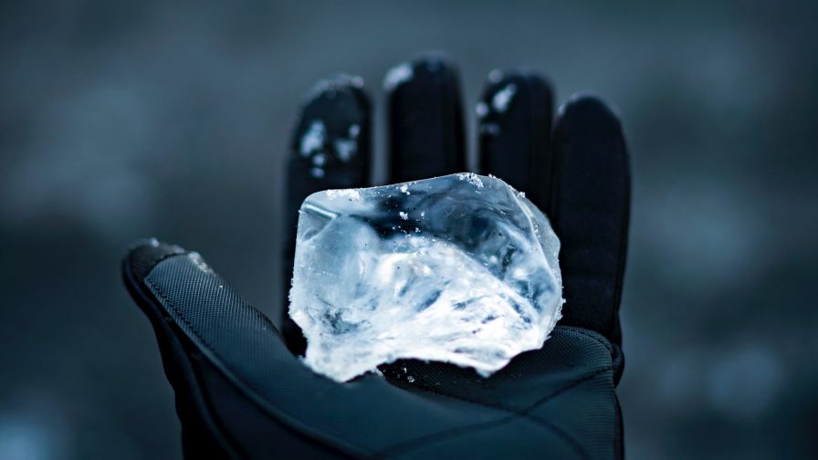 Ice on a hand HD Wallpaper