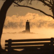 Lighthouse covered in fog HD Wallpaper