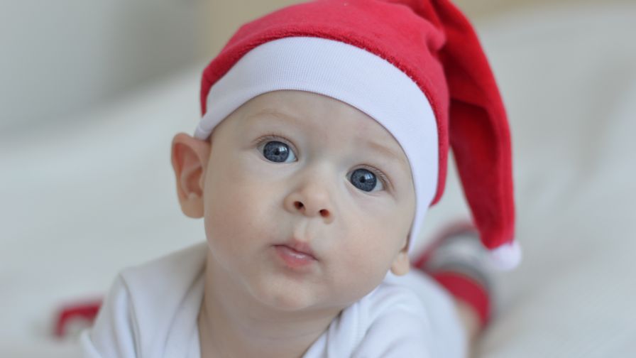 Little Cute Baby Santa Claus 4K HD Wallpaper for Desktop and Mobiles