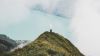 Man standing at mountain peak HD Wallpaper