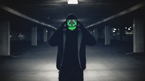 Man wearing a glowing mask HD Wallpaper
