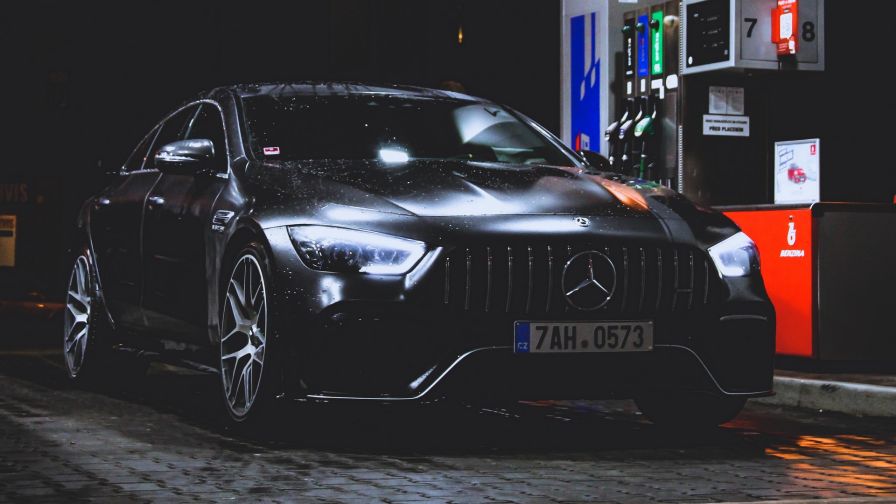 Mercedes at a petrol station HD Wallpaper