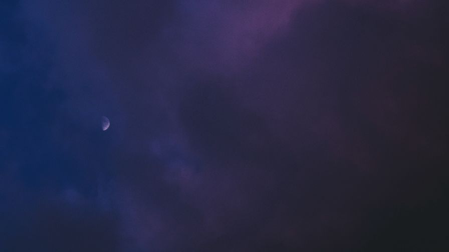 Moon covered by clouds HD Wallpaper