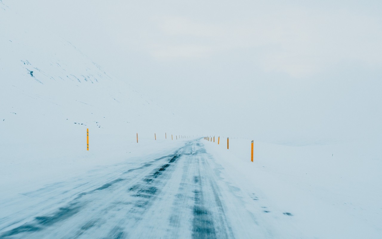 Slippery road covered in ice HD Wallpaper