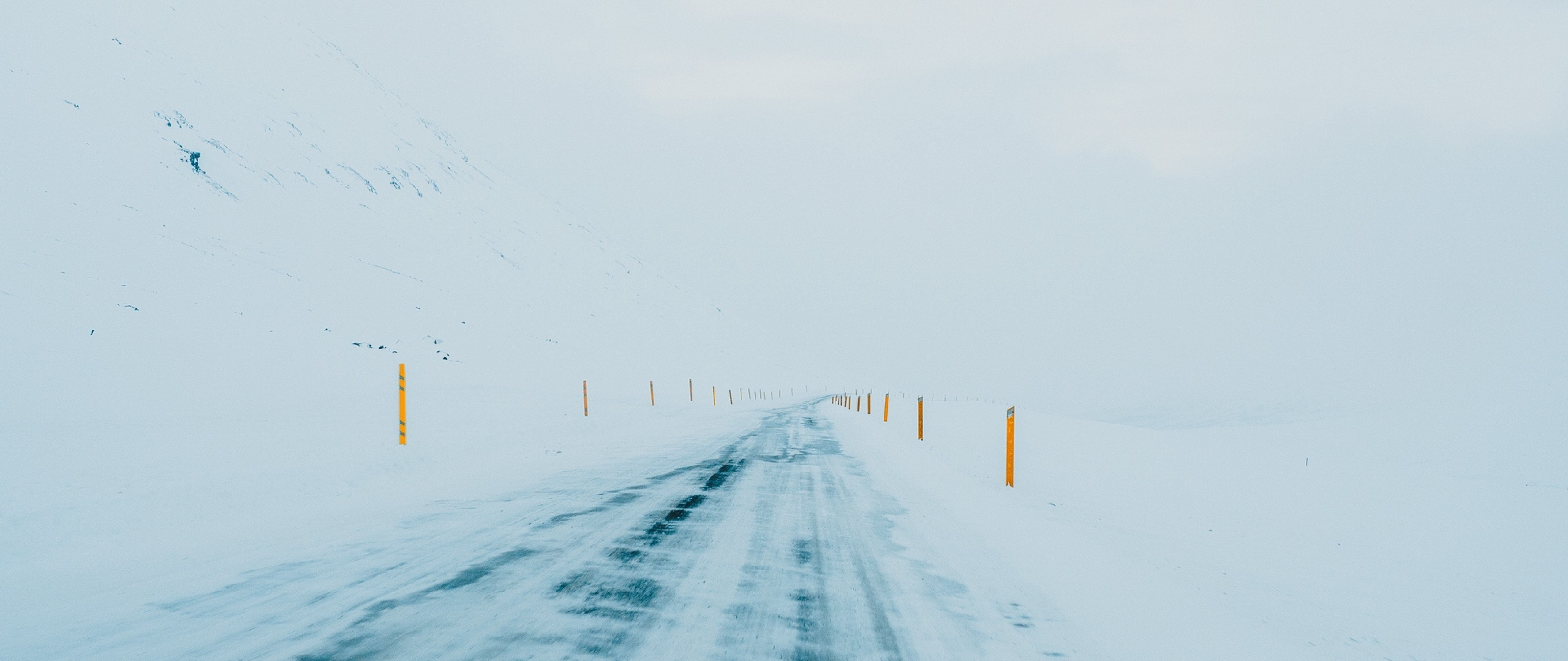 Slippery road covered in ice HD Wallpaper