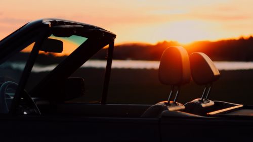 Sunset view from inside of a convertible HD Wallpaper