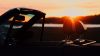 Sunset view from inside of a convertible HD Wallpaper