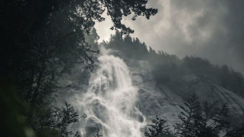 Waterfall covered in fog HD Wallpaper